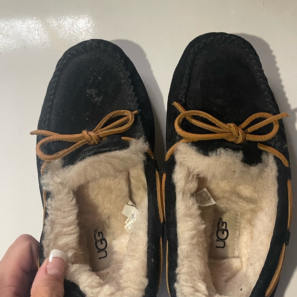 Ugg Moccasins, just a little dirt from being in the basement! Never worn